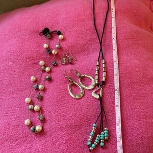 Two necklaces one pair earrings